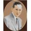 ในหลวงทรงชุดสากลสีเทา (วงรี)
