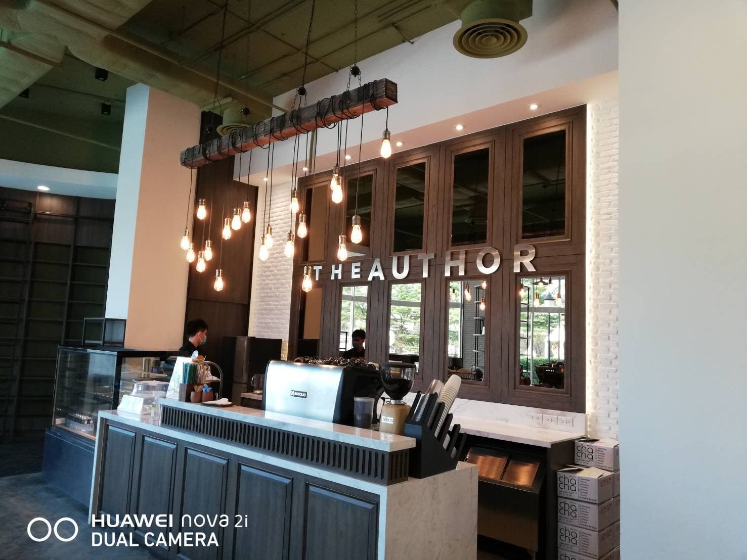 ป้ายสแตนเลส หน้าเงิน THEAUTHOR