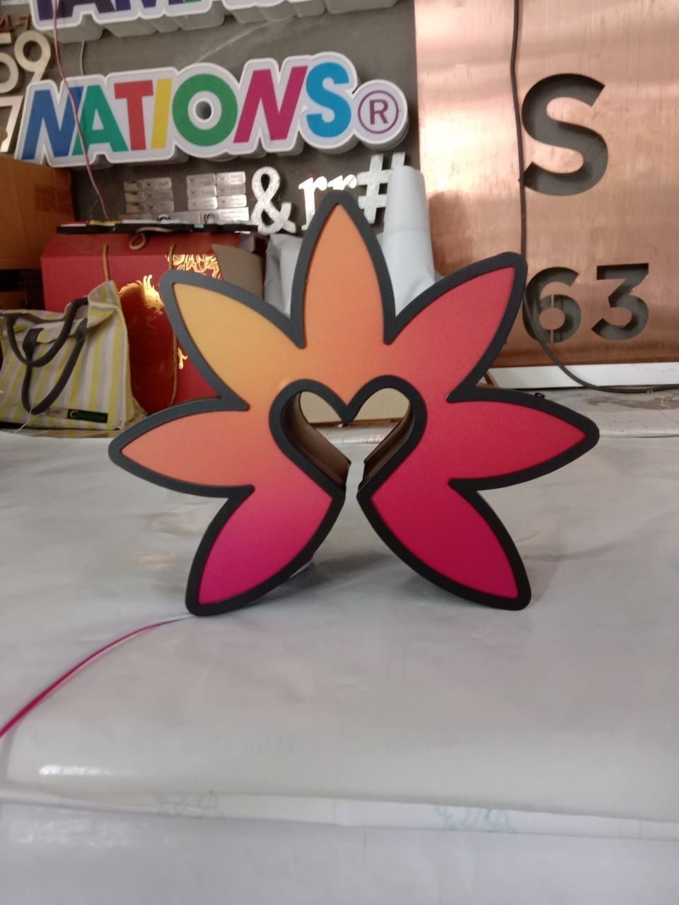 ป้ายไฟออกหน้ารูปดอกไม้