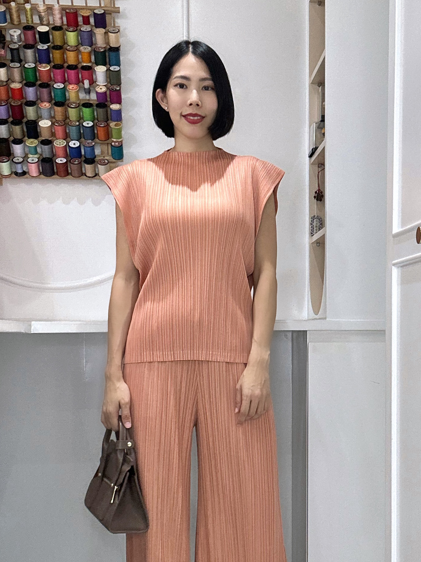 Set เสื้อ + กางเกงพลีต สีส้ม FREE SIZE สำเนา