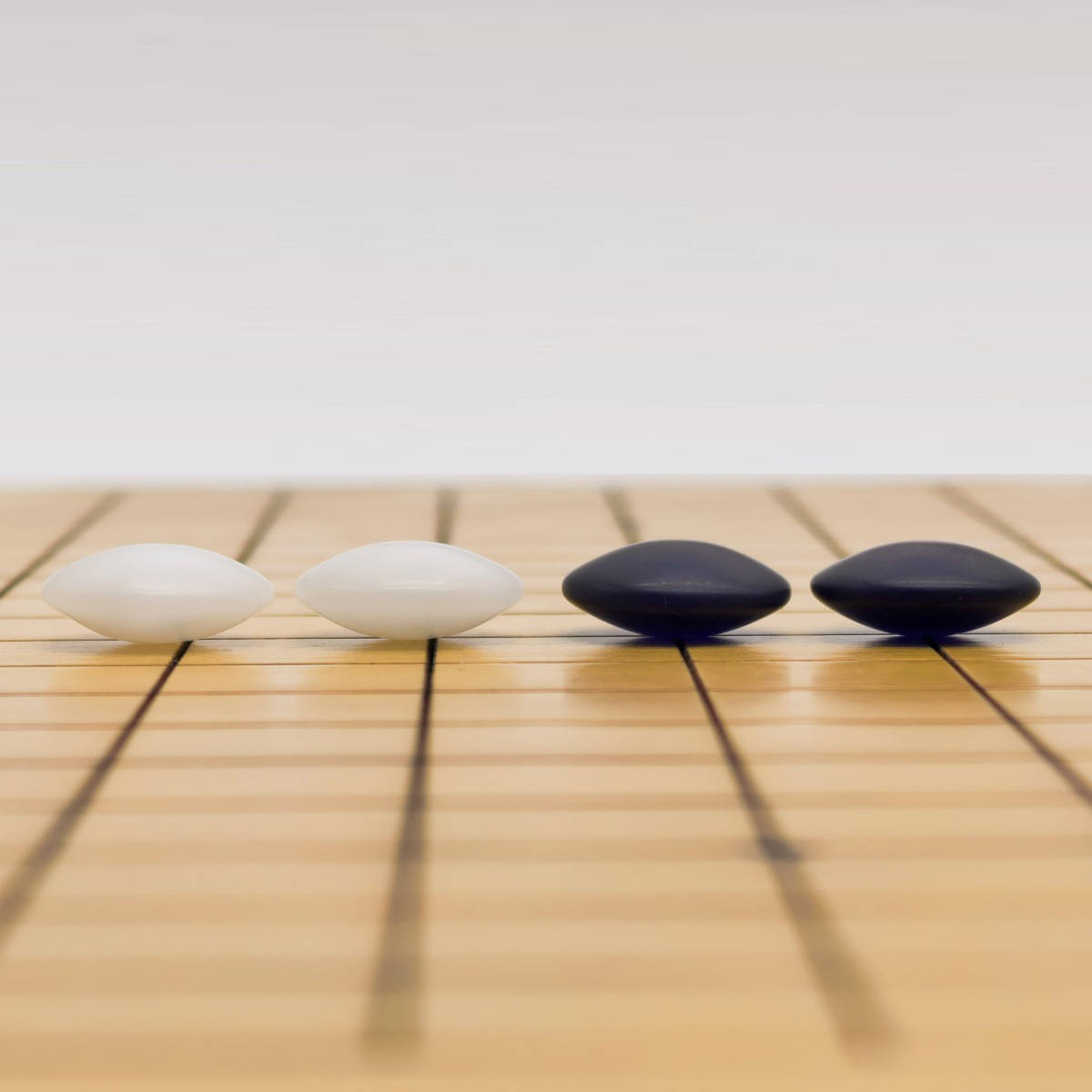 เม็ดหมากล้อมหินหยกสีคราม Indigo Jade (นูน2ด้าน)