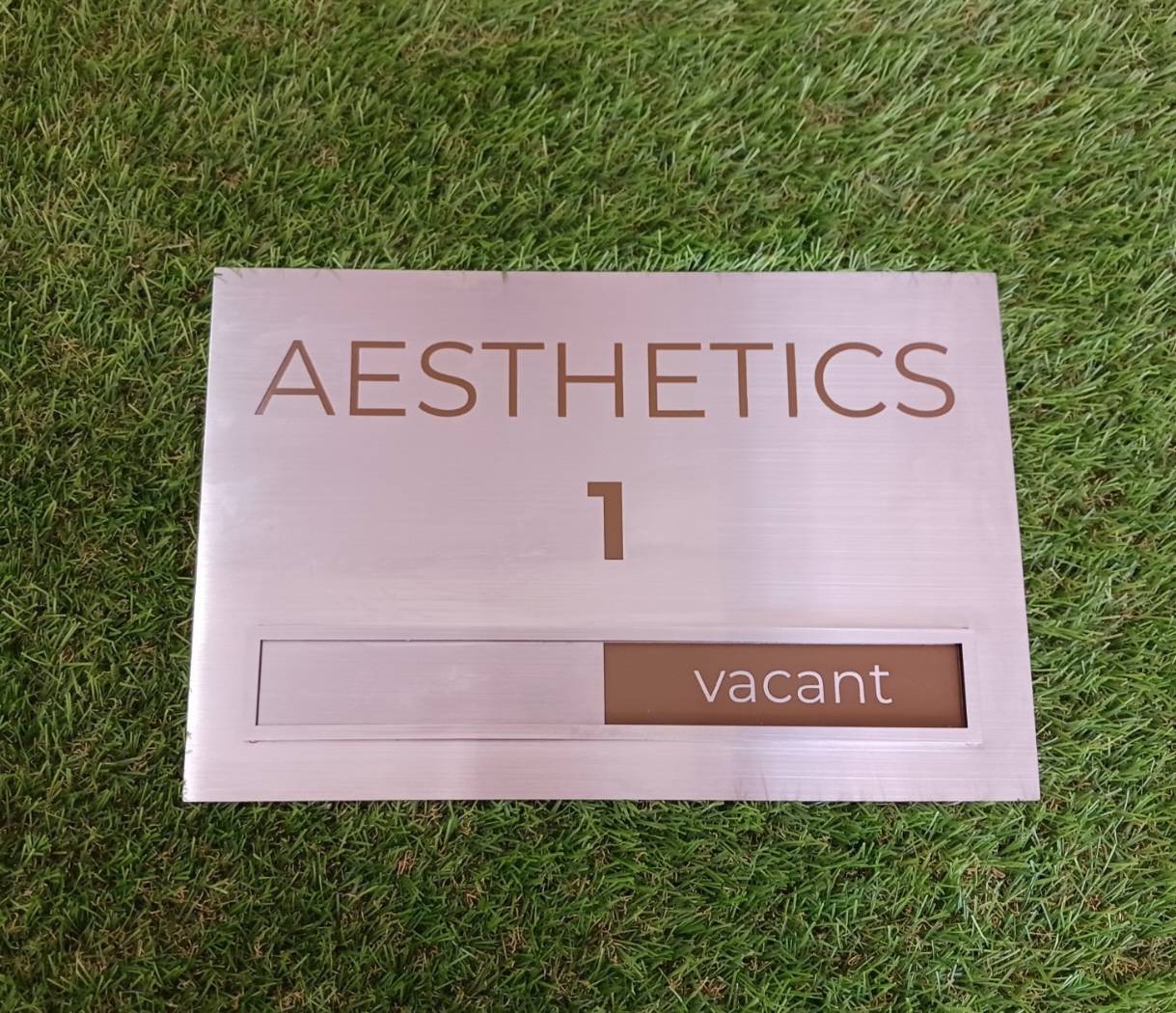 ป้ายสแตนเลสกัดกรด ป้ายรางสอด