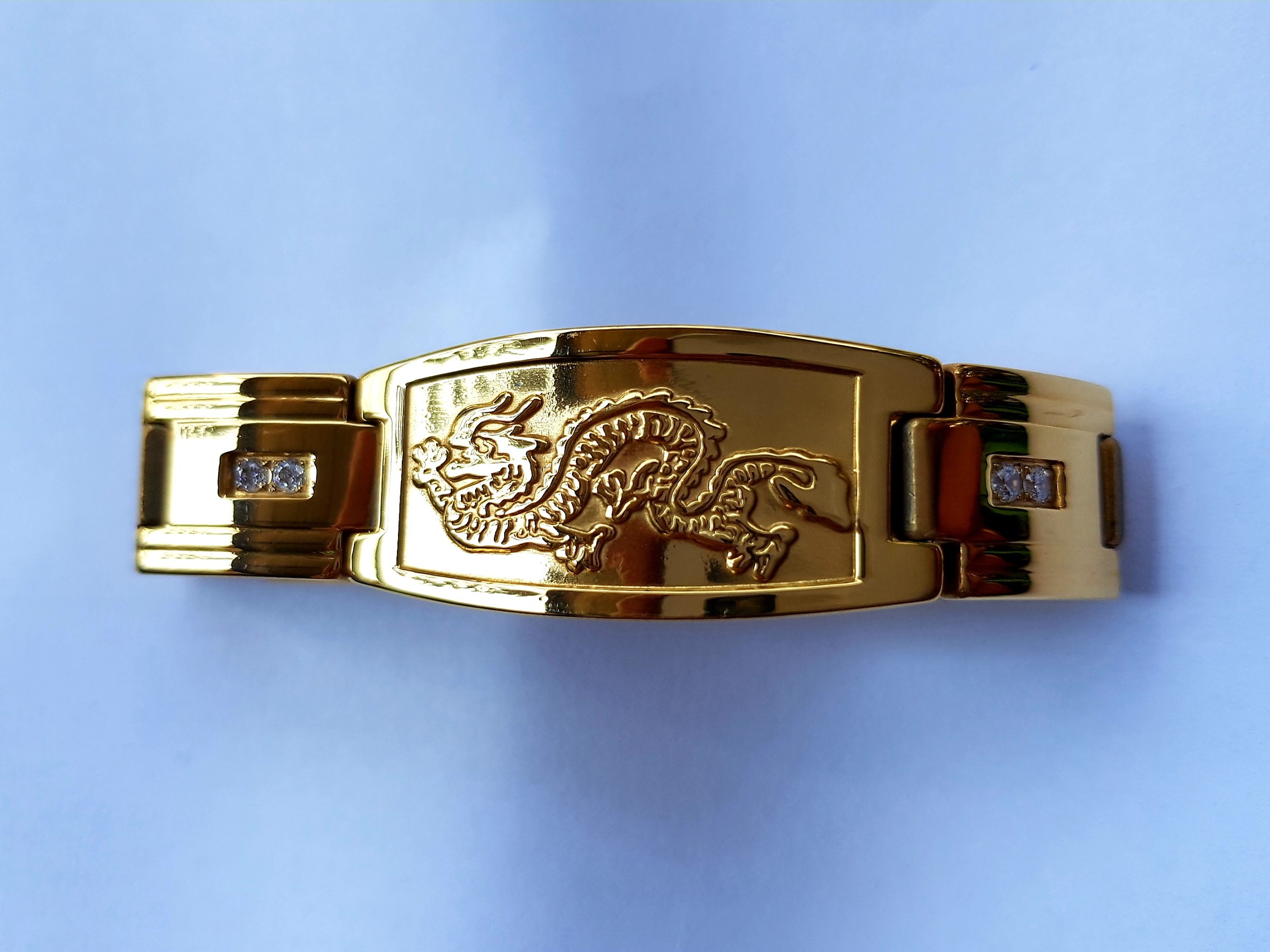 สร้อยข้อมือมังกรฝังเพชร กว้าง1.5cm. พร้อมแร่ปรับสมดุลร่างกาย งานเลเซอร์ ไม่ลอกไม่ดำ