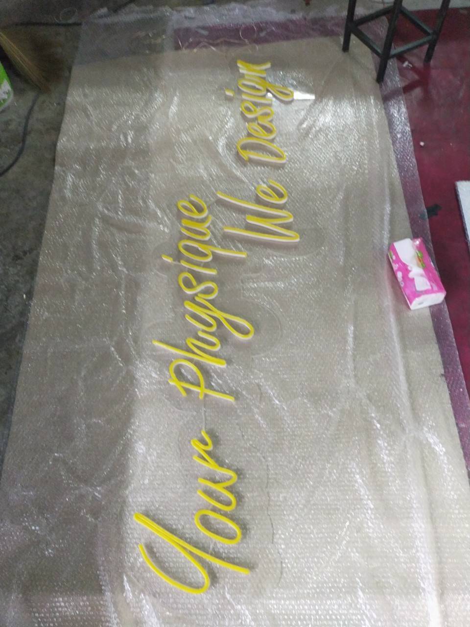 ป้ายไฟนีออนดัด แสงสีเหลือง Your phgsique We Design #วางบนอะคริลิคใสไดคัทรองหลัง