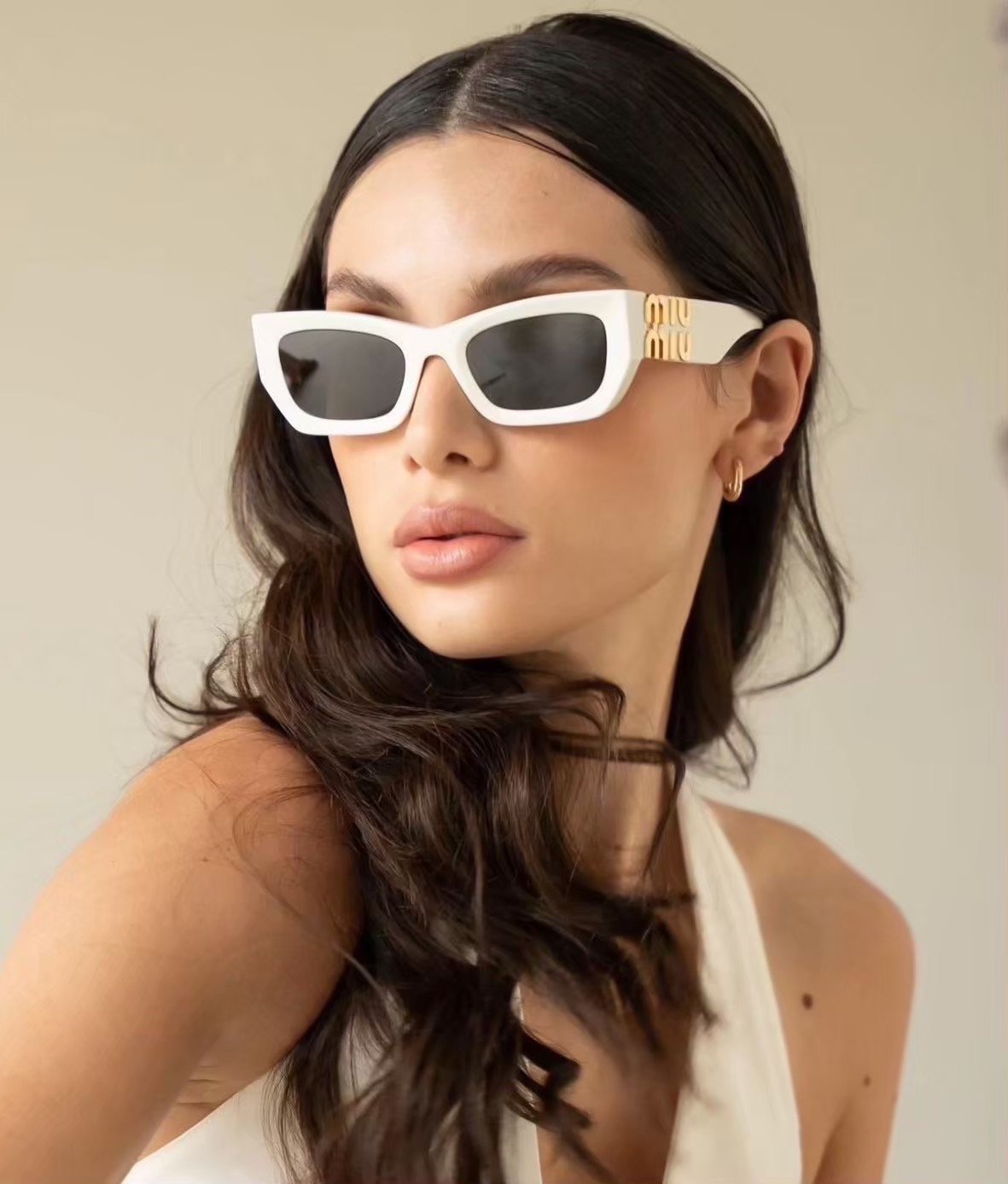 แว่นกันแดด MiuMiu Glimpse MU 09WS