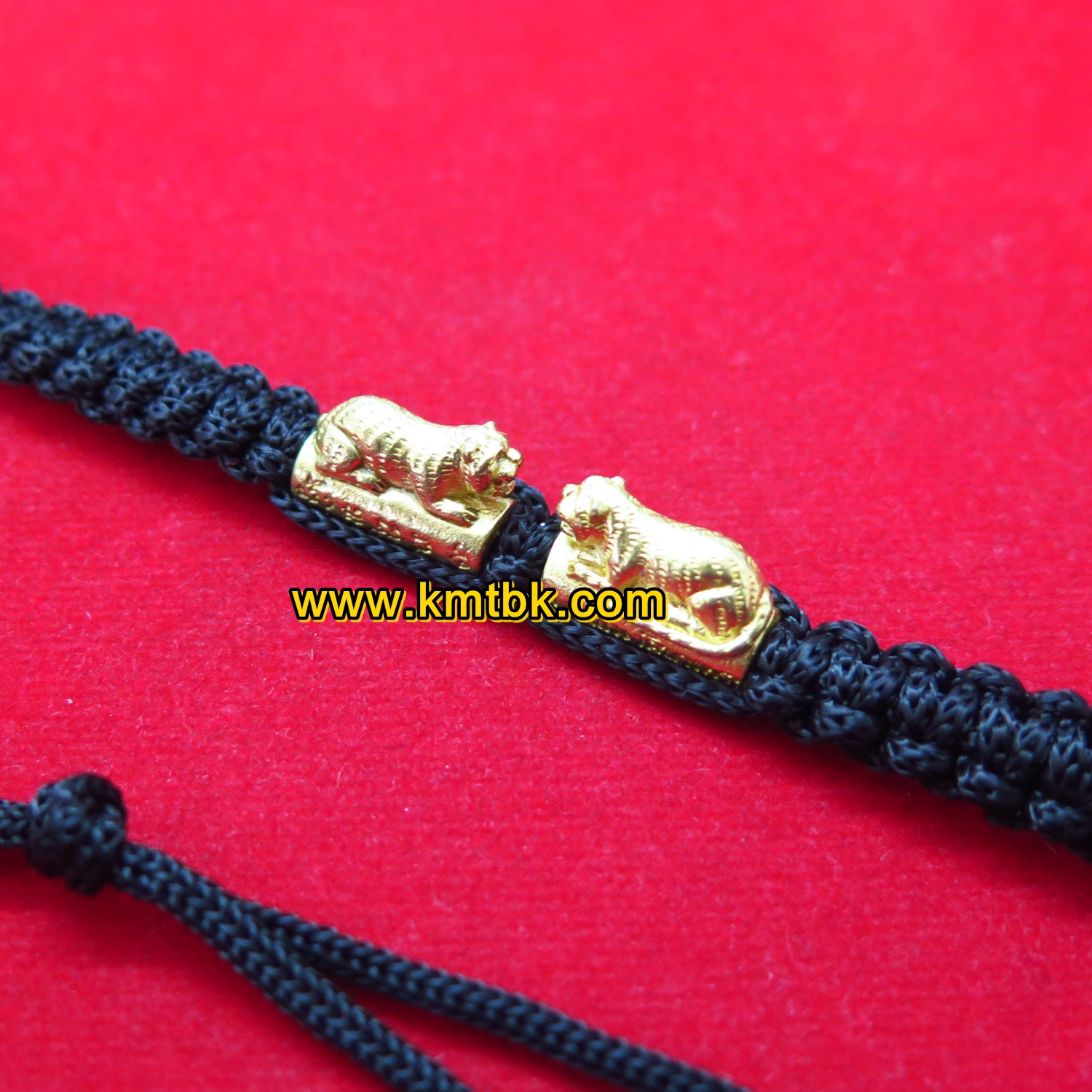ตะกรุด ข้อมือเสือ วัดบางพระ (หลวงพ่อเปิ่น) จ.นครปฐม แบบเล็กคู่ ถักเชือกดำ ขนาดยาว 15ซม. ปี2559