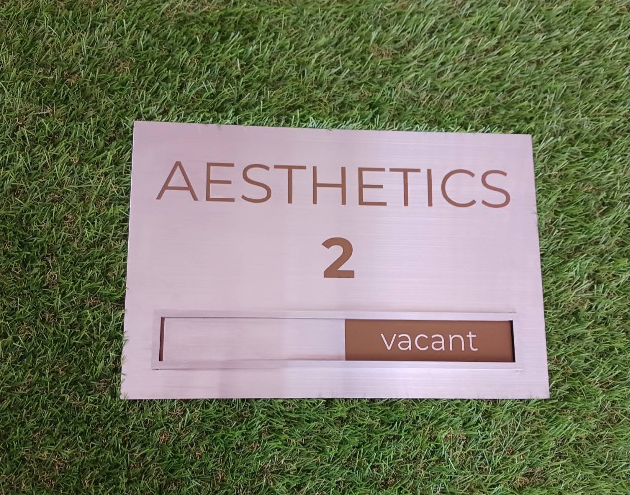 ป้ายสแตนเลสกัดกรด ป้ายรางสอด