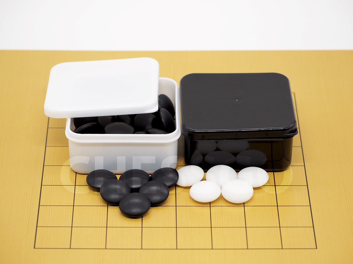 ชุดหมากล้อมไม้ (กระดานไม้บาง5mm-9เส้น+เม็ดเมลามีน40/40เม็ด+โถขาวดำS)