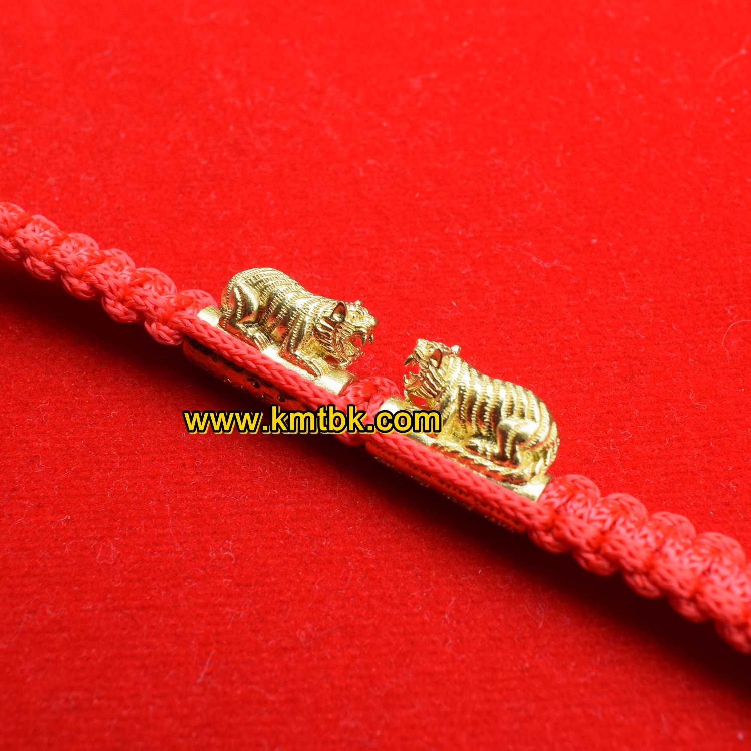 ตะกรุด ข้อมือเสือ วัดบางพระ (หลวงพ่อเปิ่น) จ.นครปฐม แบบเล็กคู่ ถักเชือกแดง ขนาดยาว 15ซม. ปี2559