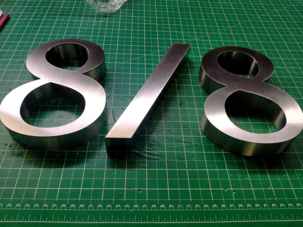 งานป้ายบ้านเลขที่ 8/8