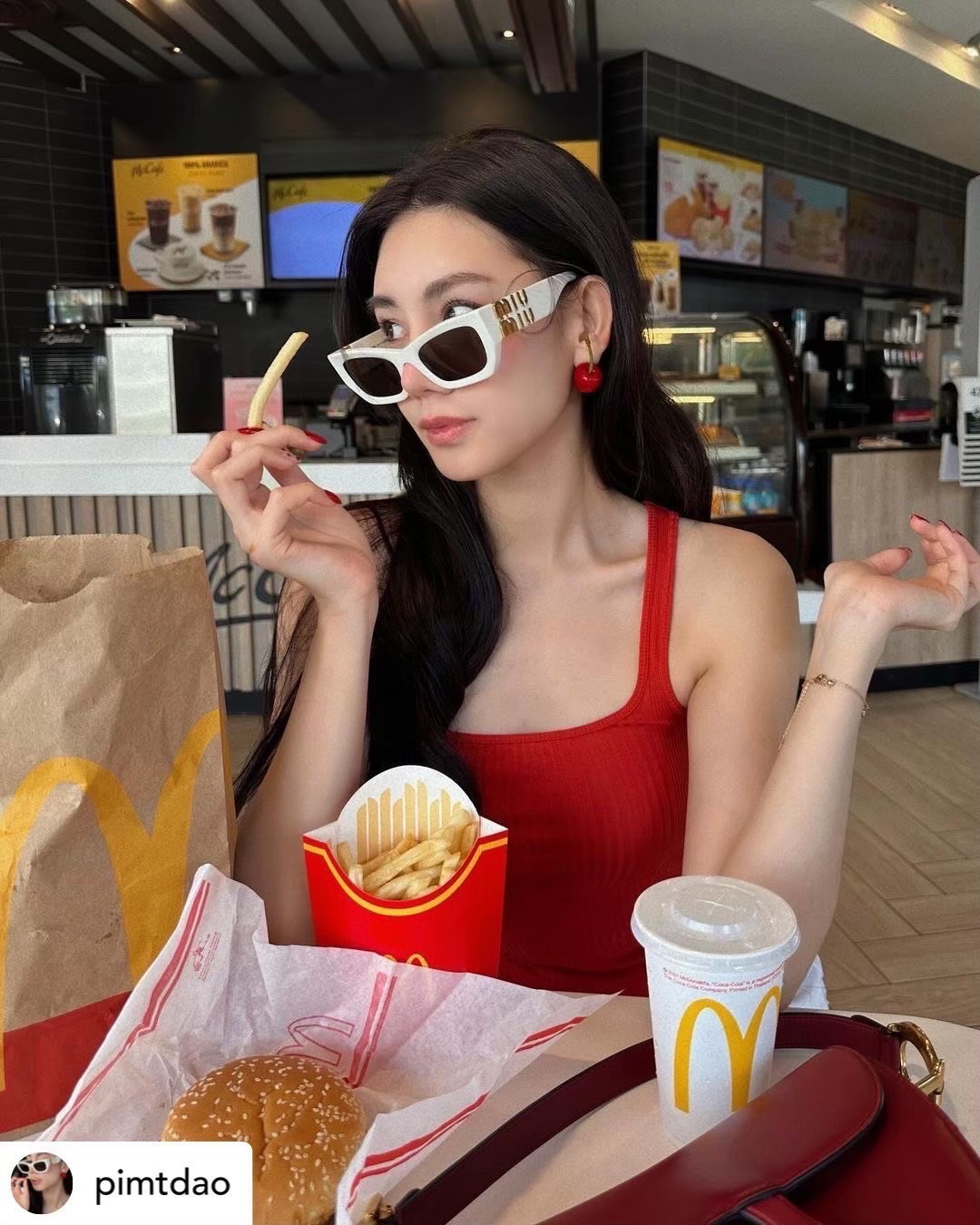 แว่นกันแดด MiuMiu Glimpse MU 09WS