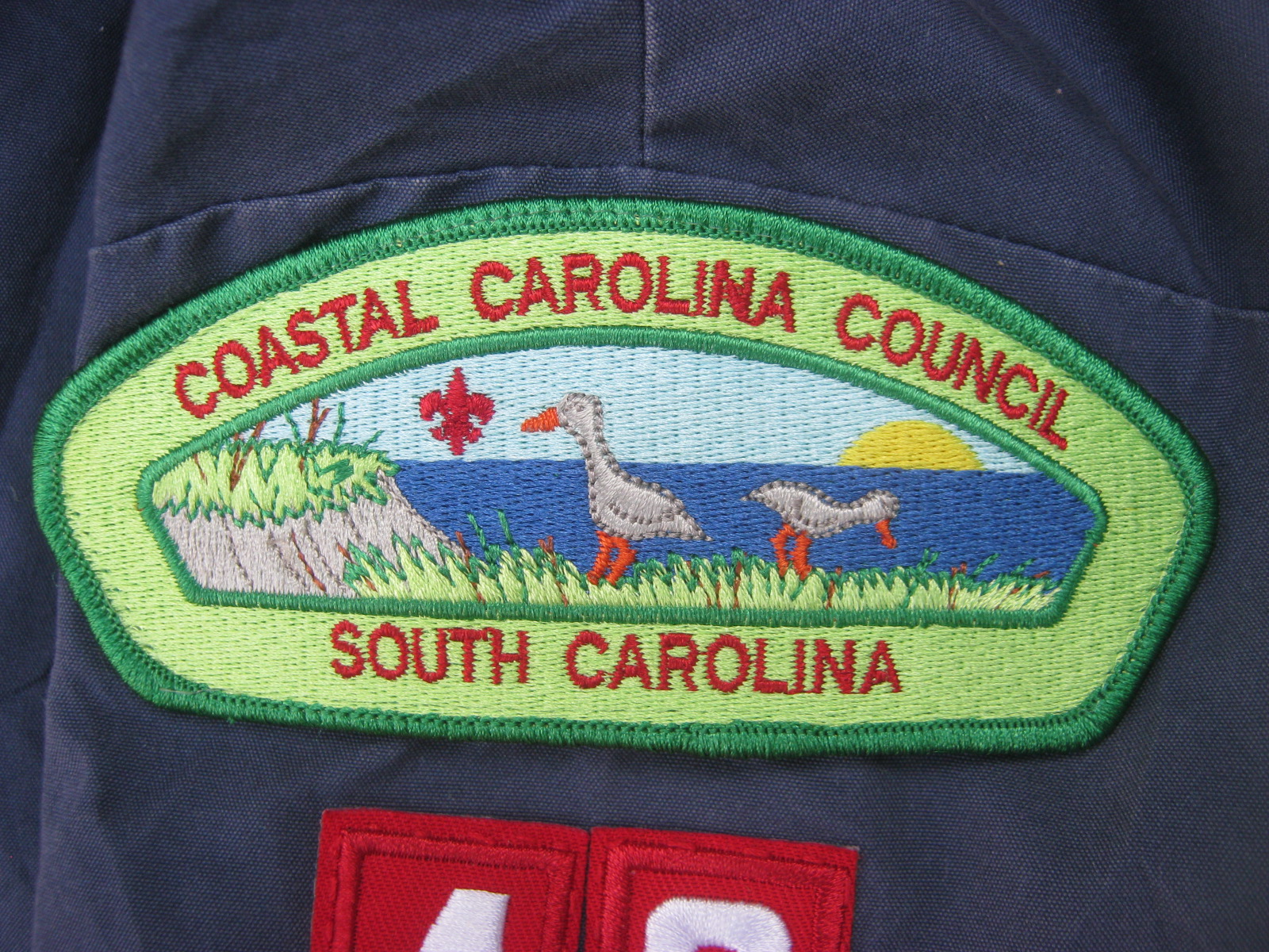 เสื้อลูกเสือพร้อมอาร์มเพื่อสะสมอาร์ม