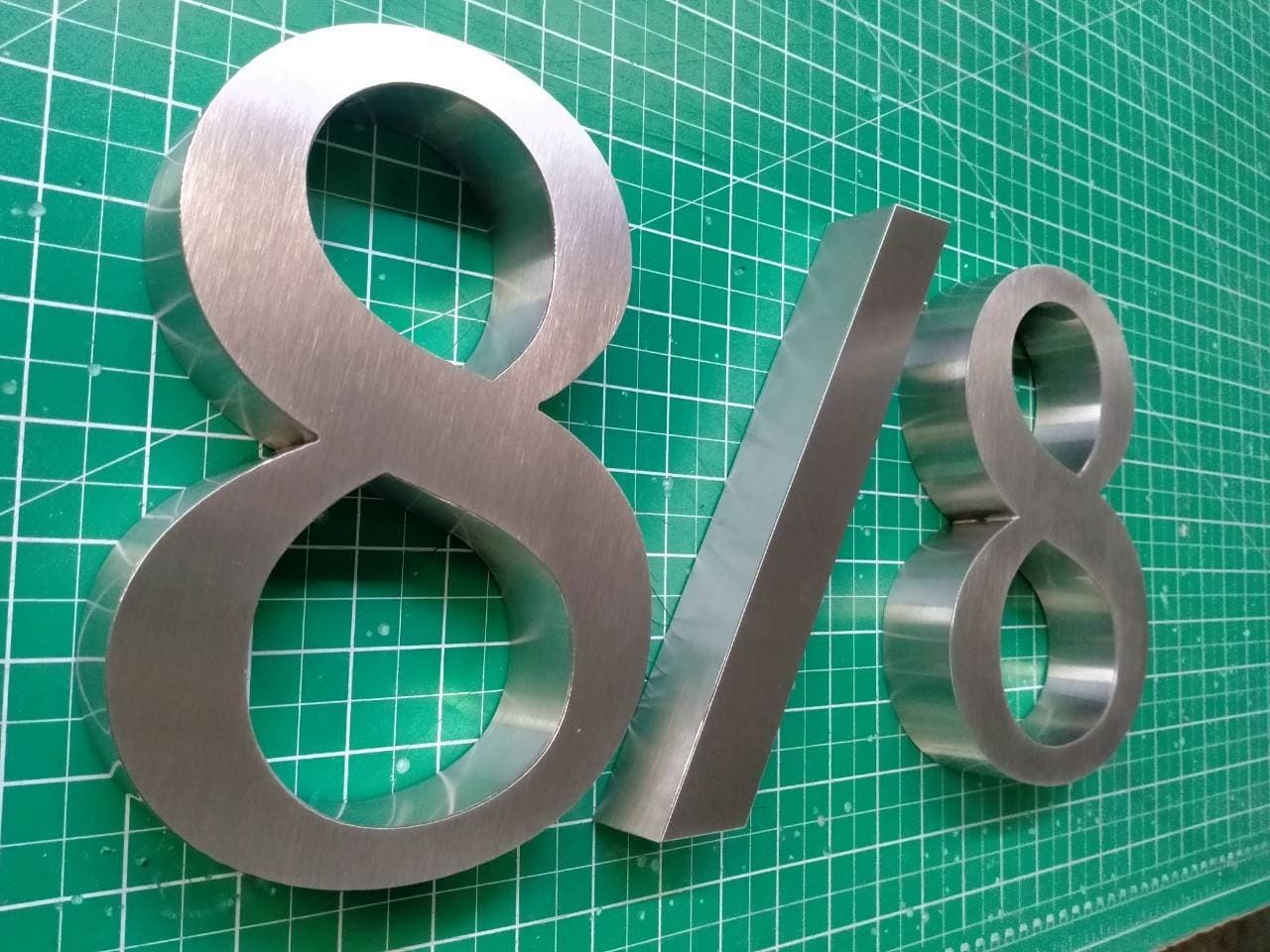 งานป้ายบ้านเลขที่ 8/8