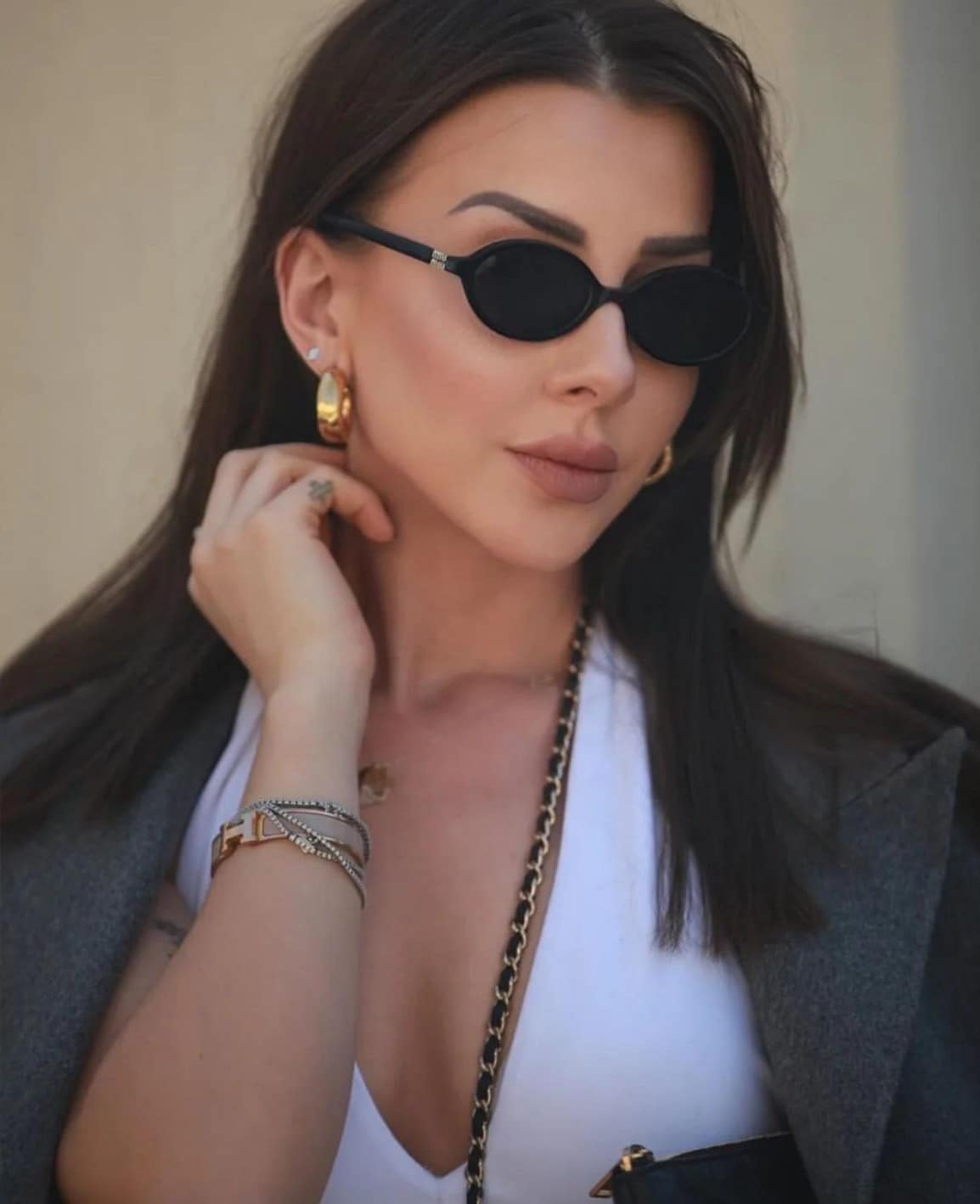 แว่นกันแดดMIUMIU Regard MU04ZS