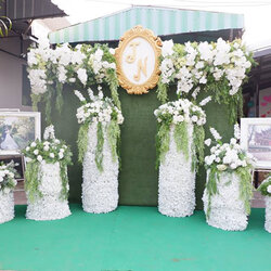 จัดดอกไม้งานแต่ง พิธีหมั้น ออกแบบ backdrop
