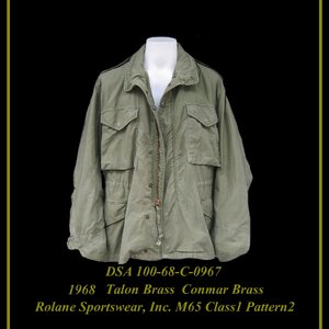 การอ่านรหัส วัสดุในการผลิต ของเสื้อ M65